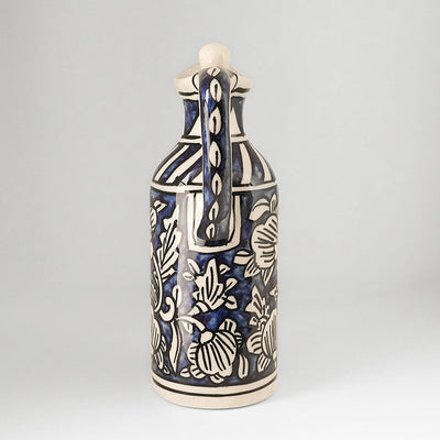 Handmade ceramic small multipurpose bottle with lid on top, blue and ivory colors
