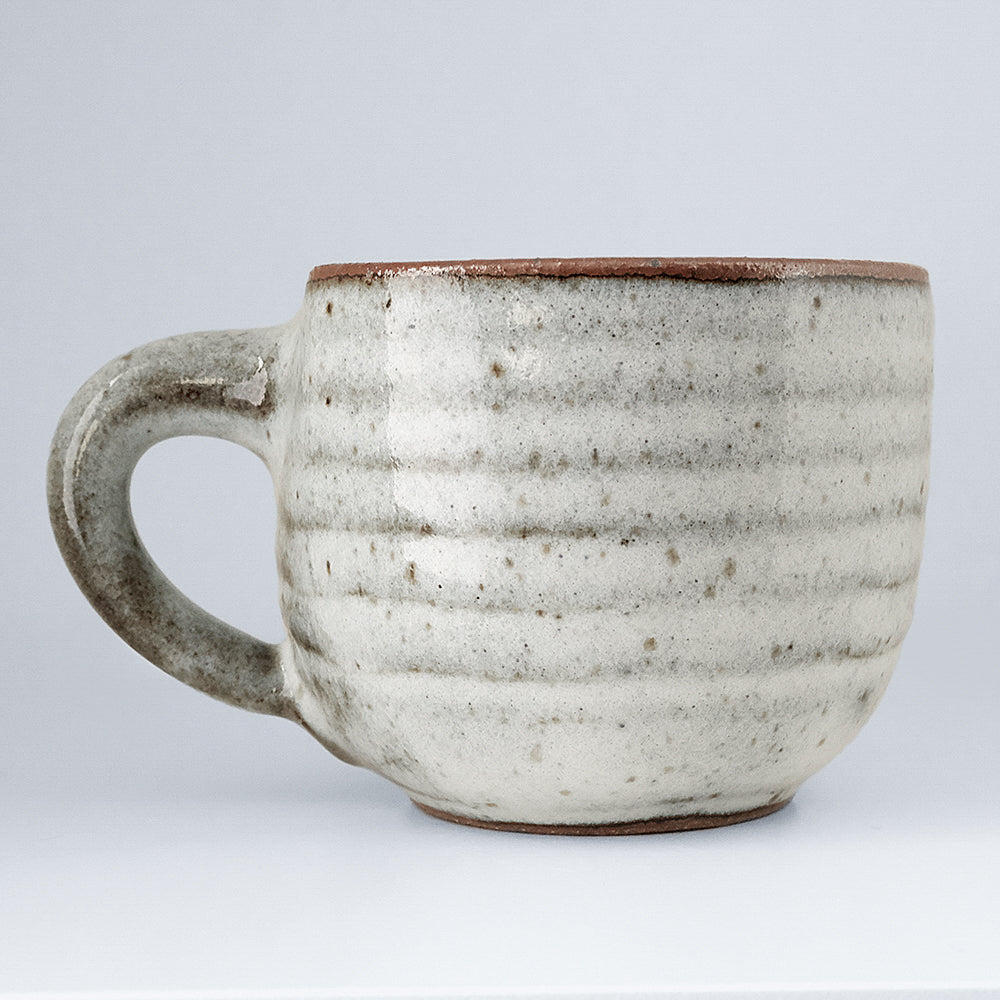 Handcrafted grey ceramic mug with speckles