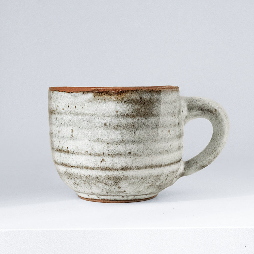 Handcrafted grey ceramic mug with speckles